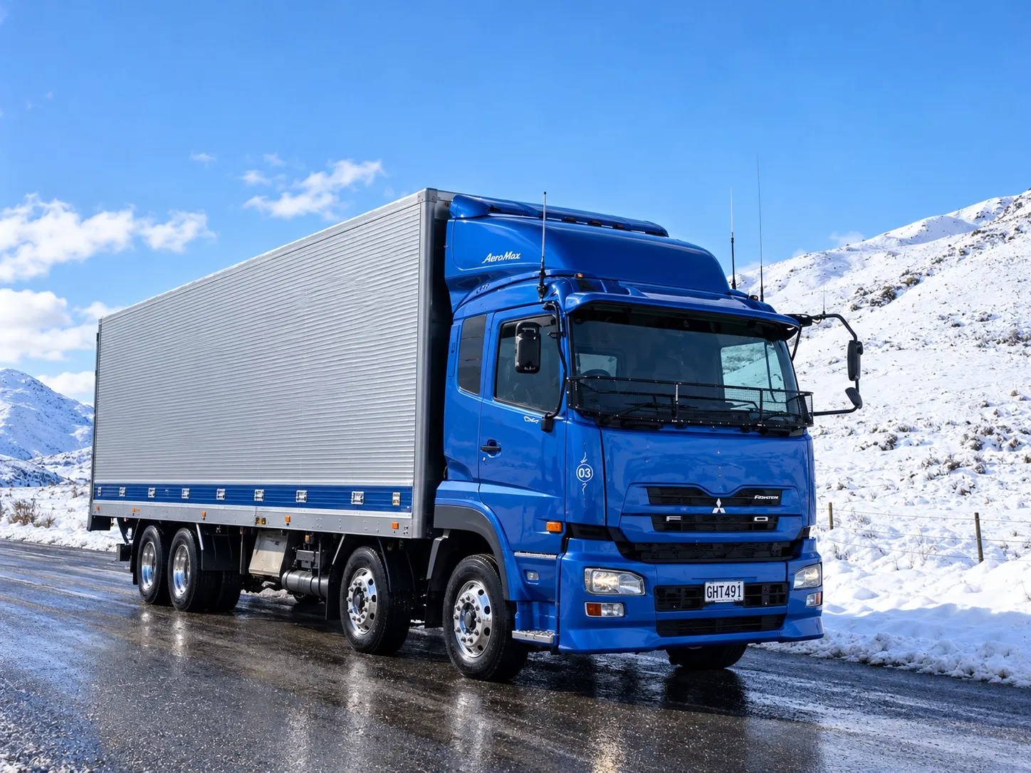 PFS truck on an alpine road in the snow